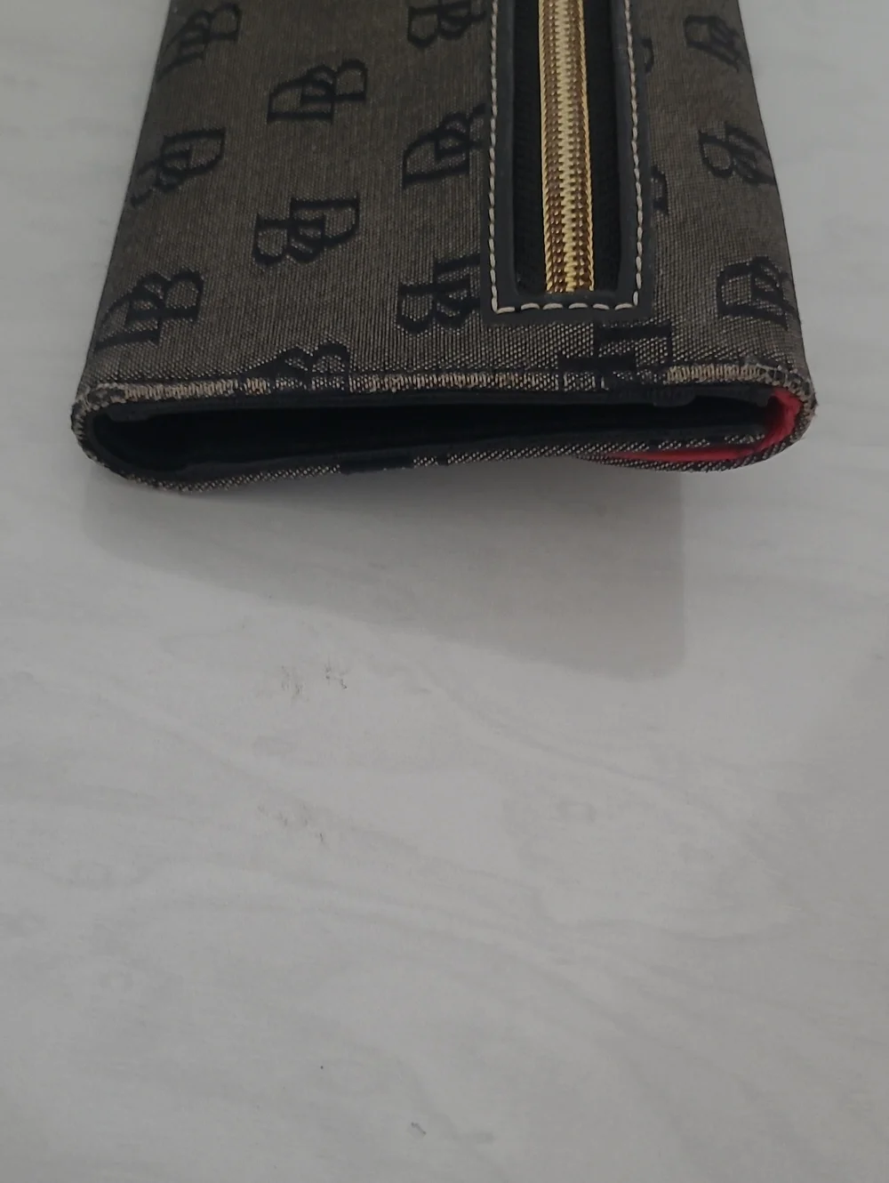 Dooney & Bourke Continental Clutch Wallet Black Looking For A New Owner.